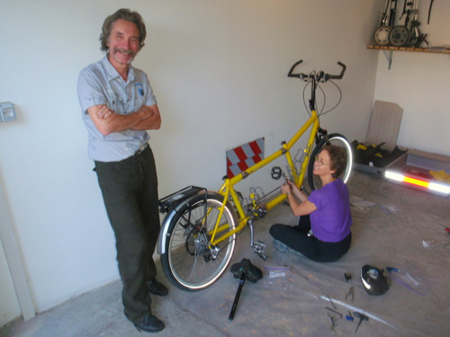 Terry is mounting the bottle cages.